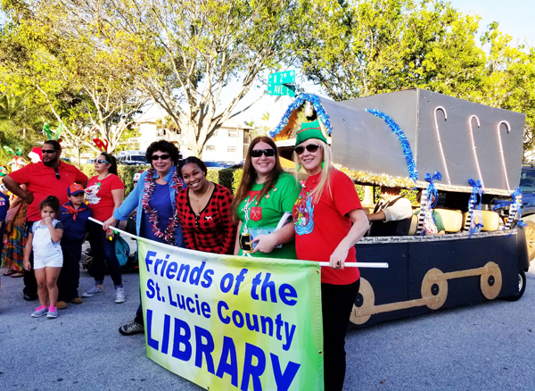 picture of Friends of the Library and Staff in Friends sponsored parade float