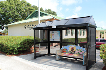 Hurston Library with bus stop