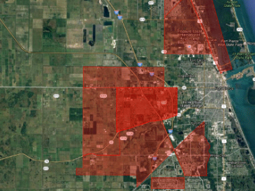 Aerial map of St. Lucie County showing fogging areas in red