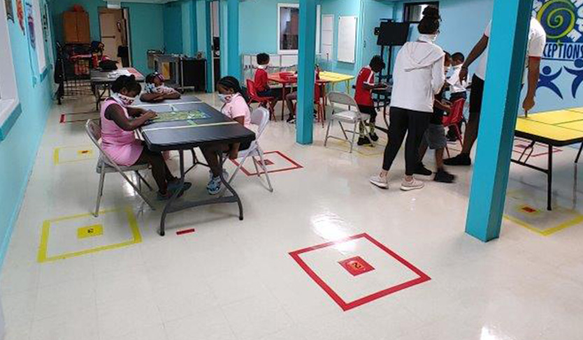 Children working on an art project at Lincoln Park Community Center